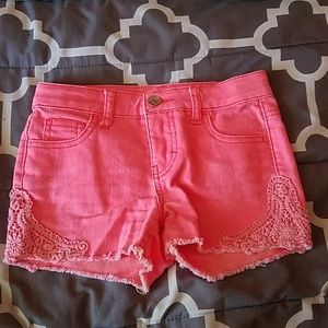 neon pink jean shorts